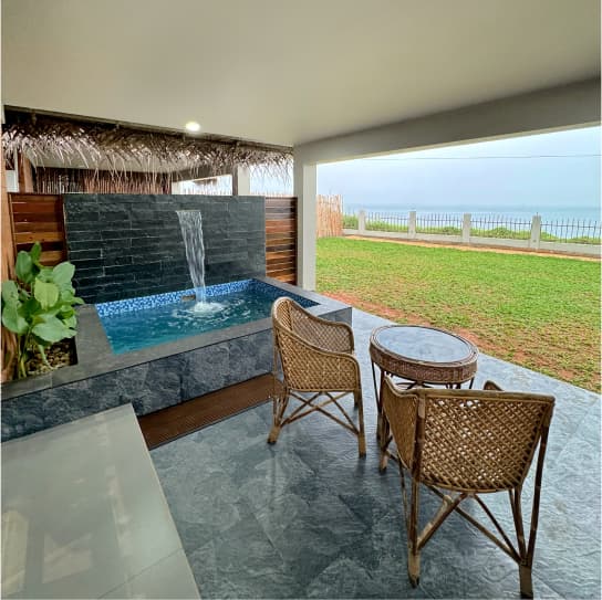 Tira Beach Resort Patio and Pool Area Patio and pool area at Tira Beach Resort with ocean view